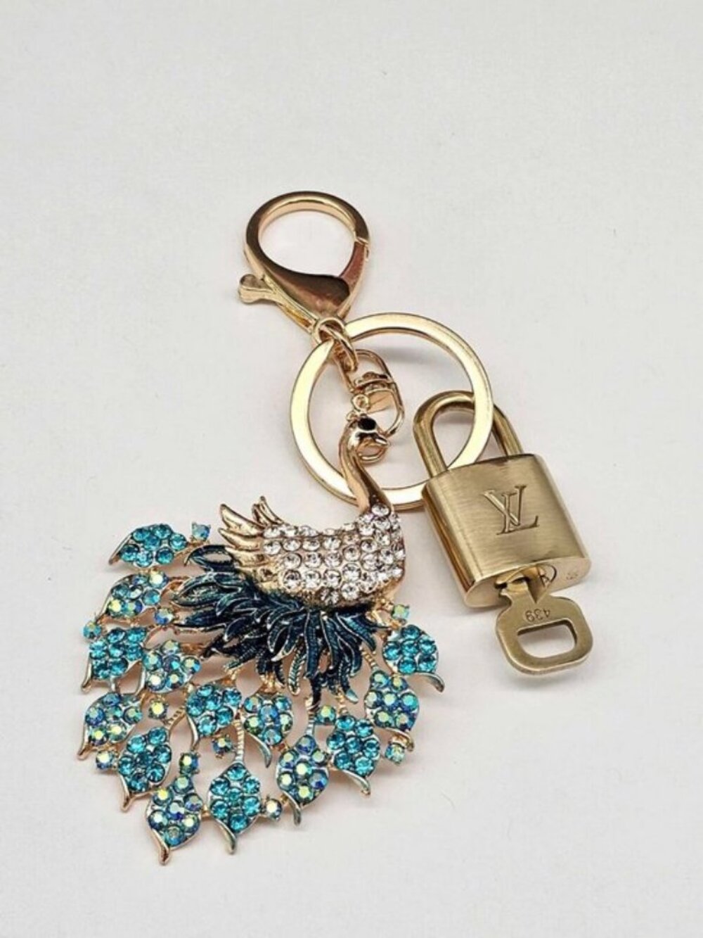 Authentic Louis Vuitton Gold Lock 🔒 Unbranded Peacock Keychain Bag Charm LV - Picture 4 of 9
